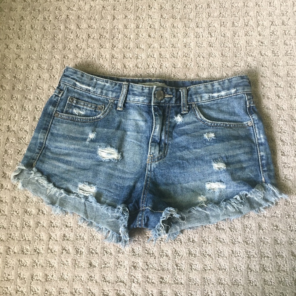 Free People Light Wash Distressed Cut Off Shorts
